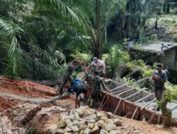 Kodim 0207/Simalungun Terus Lanjutkan Pembangunan Jembatan Gantung di Bosar Galugur