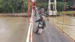 Kodim 0212/TS Tuntaskan Perbaikan Jembatan Gantung Rambin Pulo Goya di Tapsel