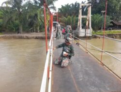 Kodim 0212/TS Tuntaskan Perbaikan Jembatan Gantung Rambin Pulo Goya di Tapsel