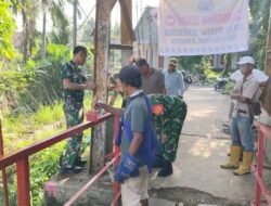 Kodim 0203/Langkat Rampungkan Rehabilitasi Jembatan Gantung di Desa Dalan Naman